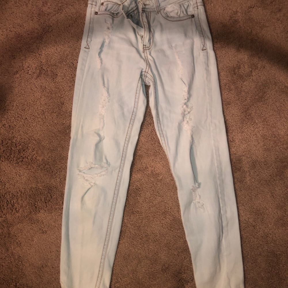 High waisted ripped jeans